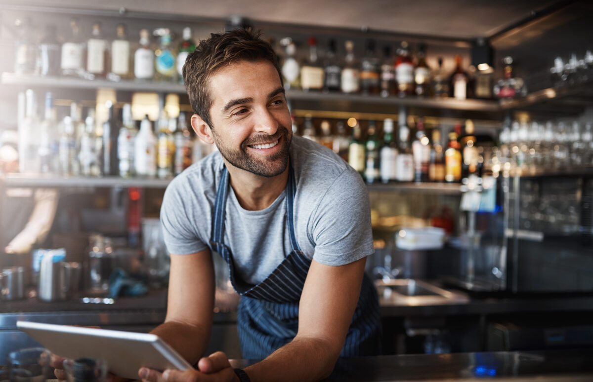 Bartender at his bar