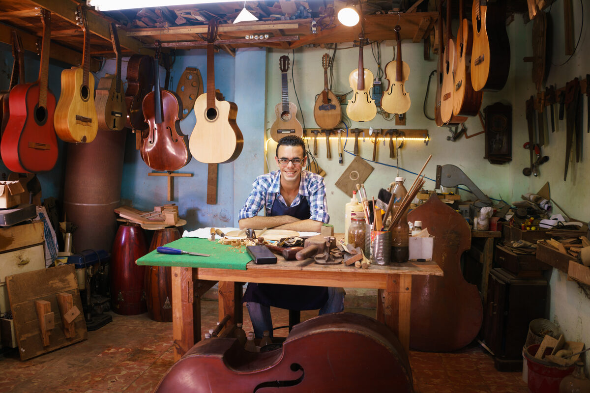 Guitar maker in his workshop
